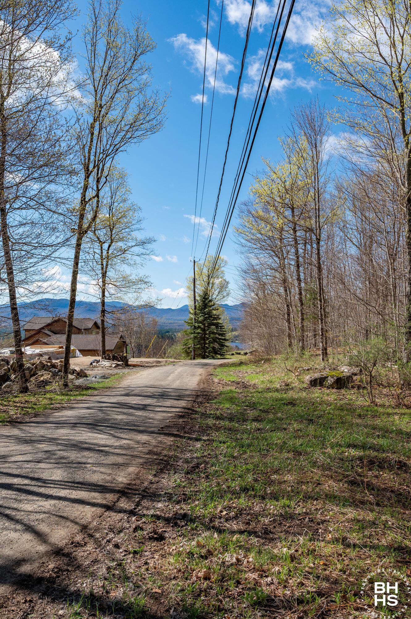 Image 2: Lot13OnPanorama_Spring_Road_View
