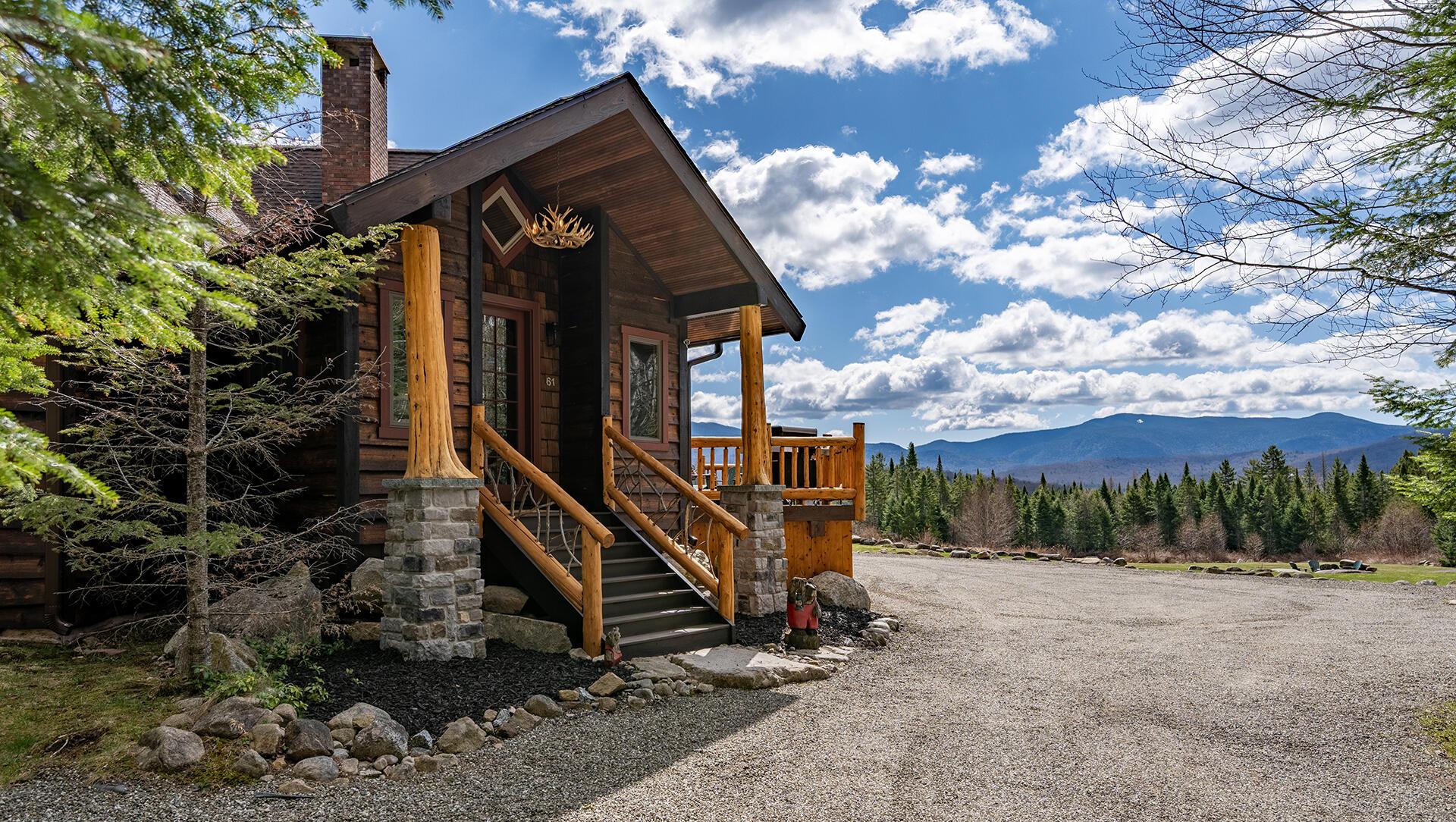 Image 2: LakePlacidHomeOnCoyote_Exterior_MH_Entra
