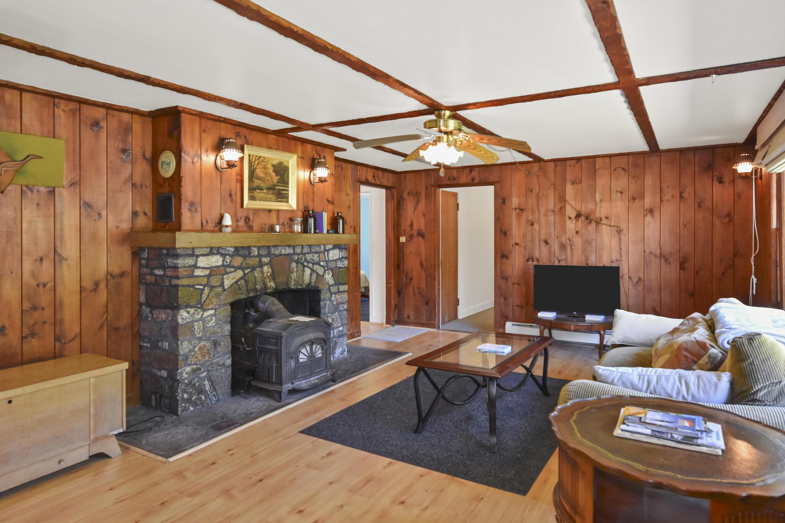 Image 4: Living Room with Fireplace