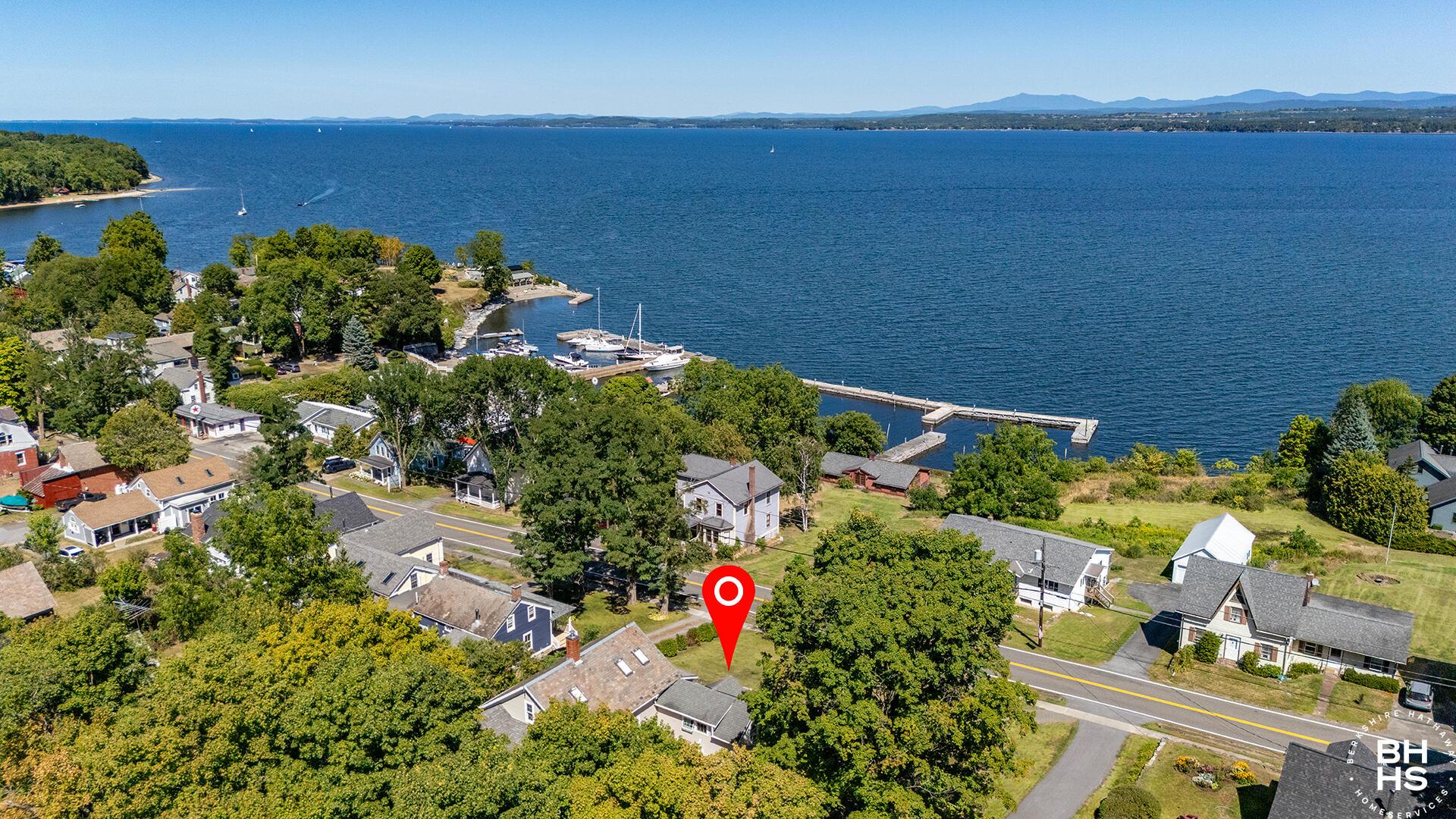 Image 3: EssexHomeWithLakeViews_A_Property_Back_R