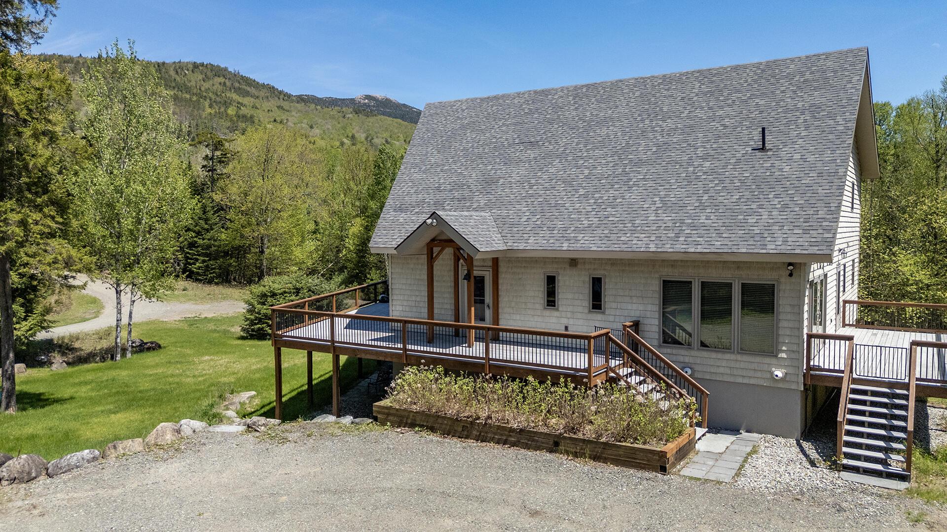 Image 3: KeeneHomeStunningMtnViews_Spring_Exterio
