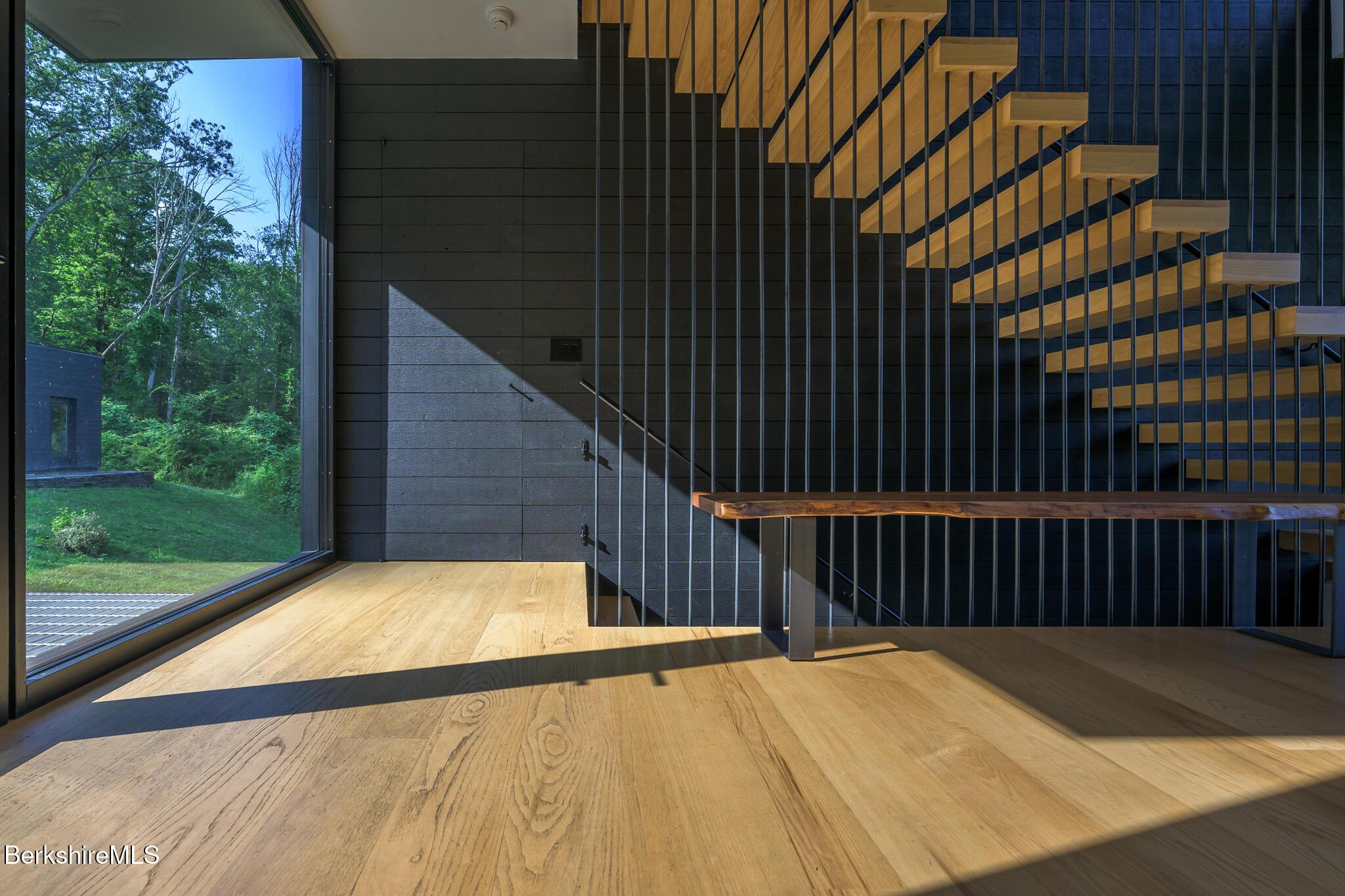 Image 2: ENTRY WITH FLOATING ASH STAIRCASE