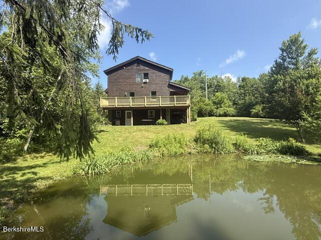 Image 4: Rear of house from swimming pond