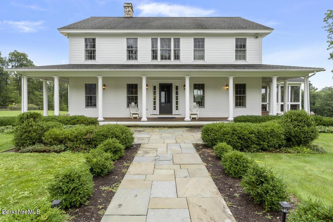 Image 4: Front with Wrap Around Porch