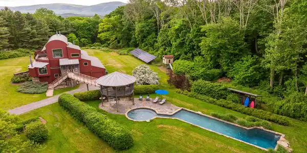Image 3: Aerial of house with pool