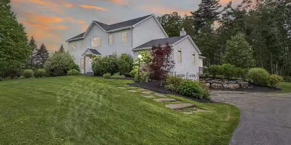 Image 2: Expansive lawn & welcoming approach