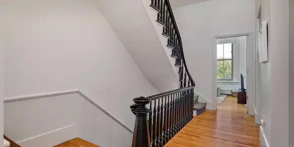 Image 4: Stairway up from front entry