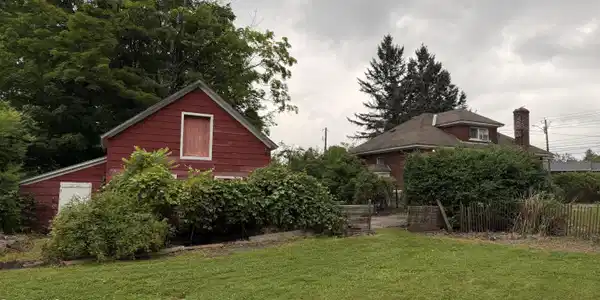 Image 3: garage and house