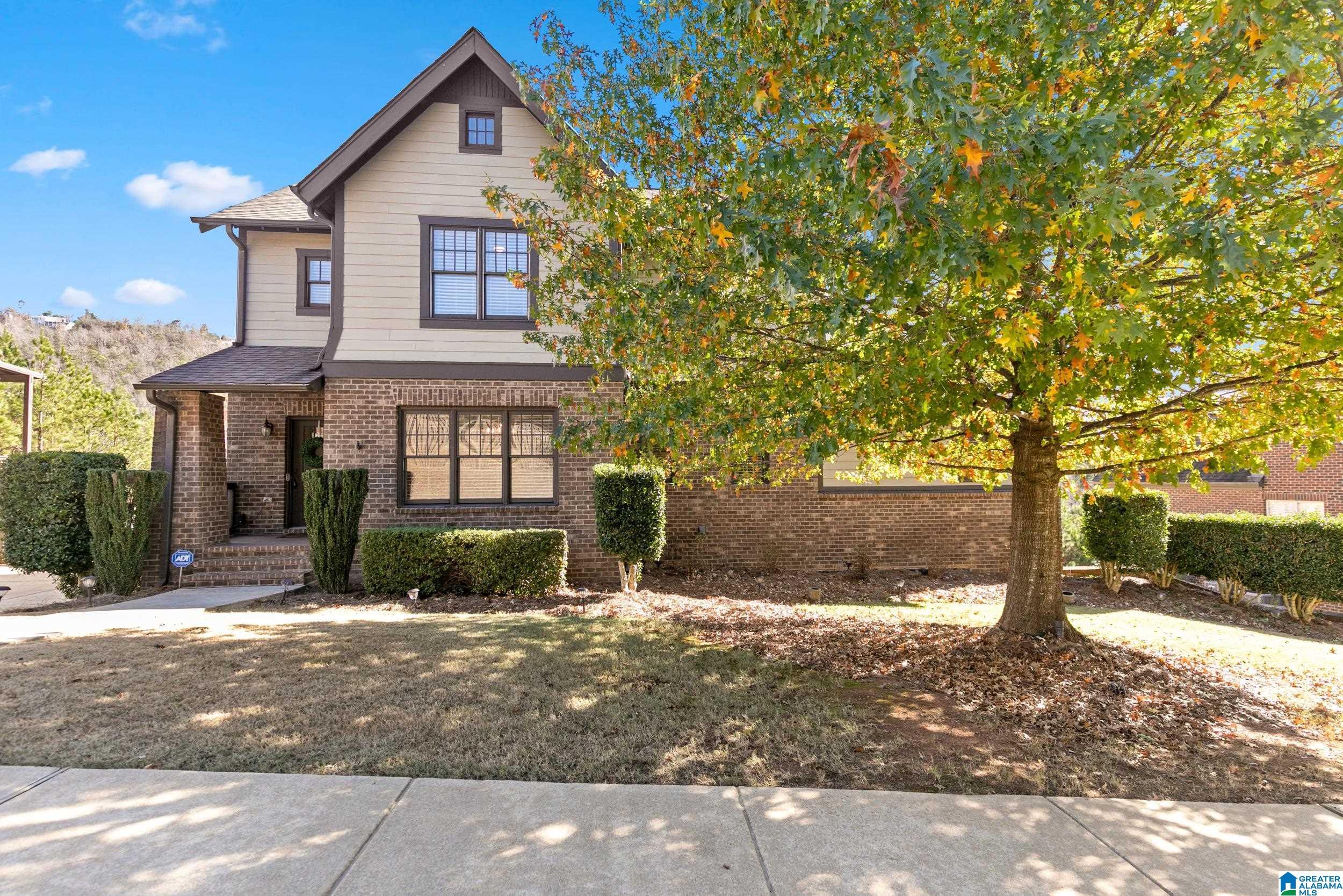 Image 1: 4 sided brick with hardiplank