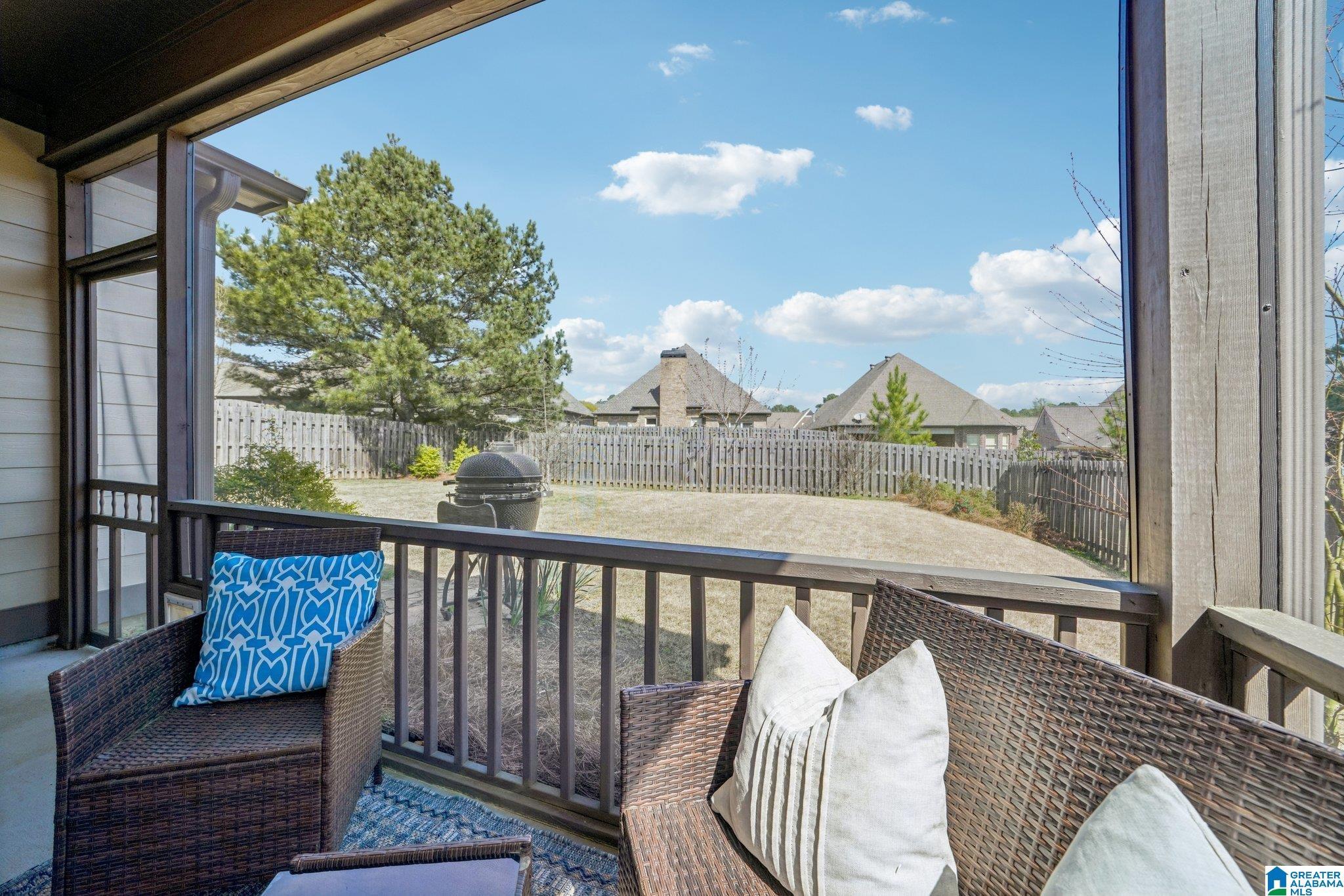 Image 2: SCREENED PORCH WITH FLAT FENCED BACKYARD