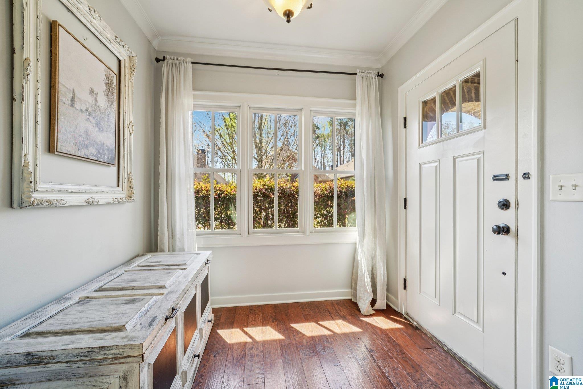 Image 3: LIGHT FILLED FOYER