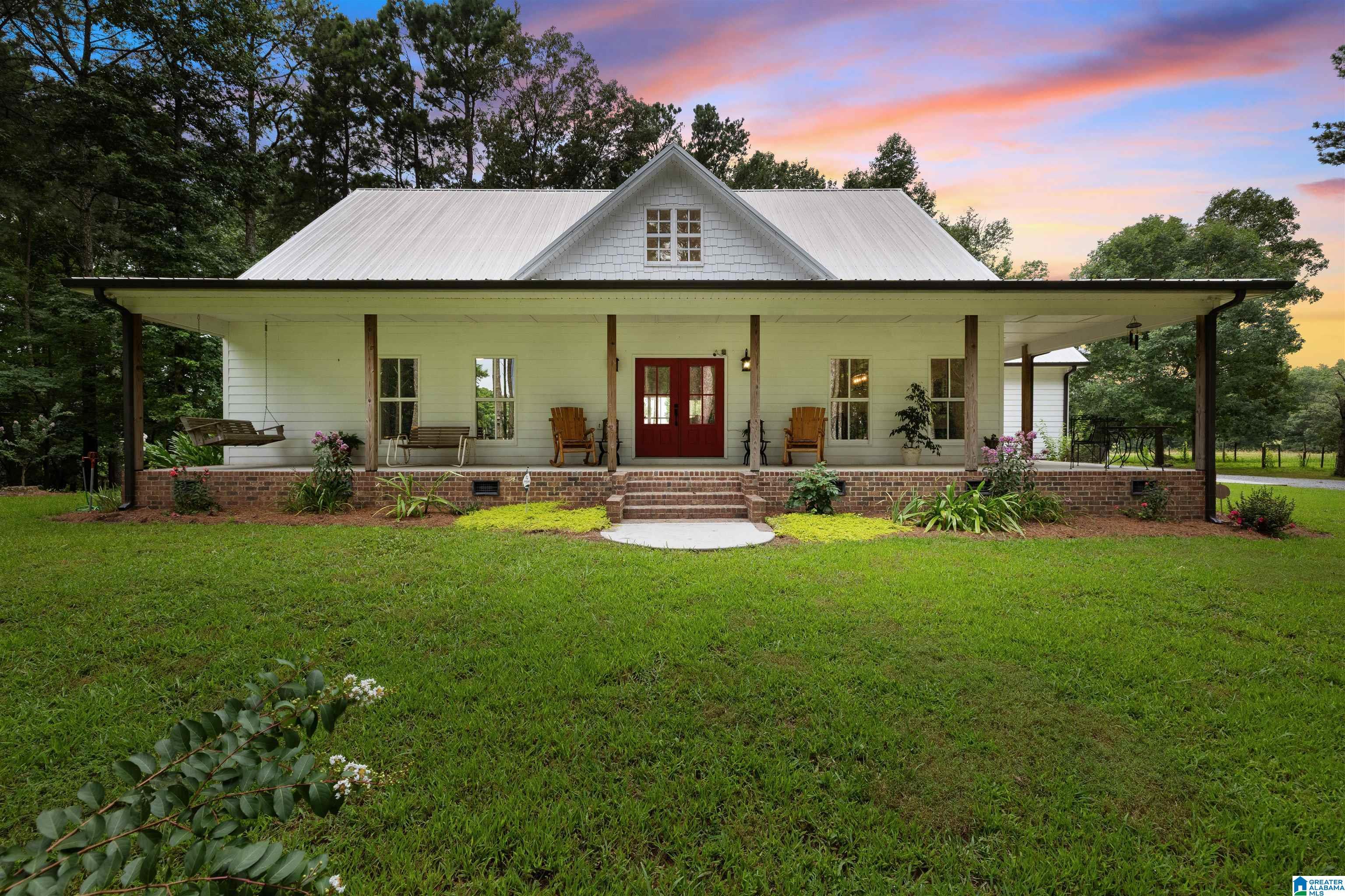 Image 2: Front View of 4 Bedroom 4 Bath Home