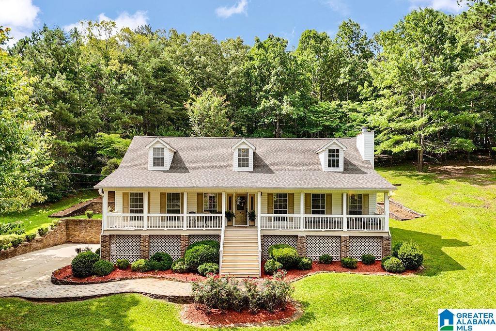 Image 2: Welcome home to an inviting front porch!