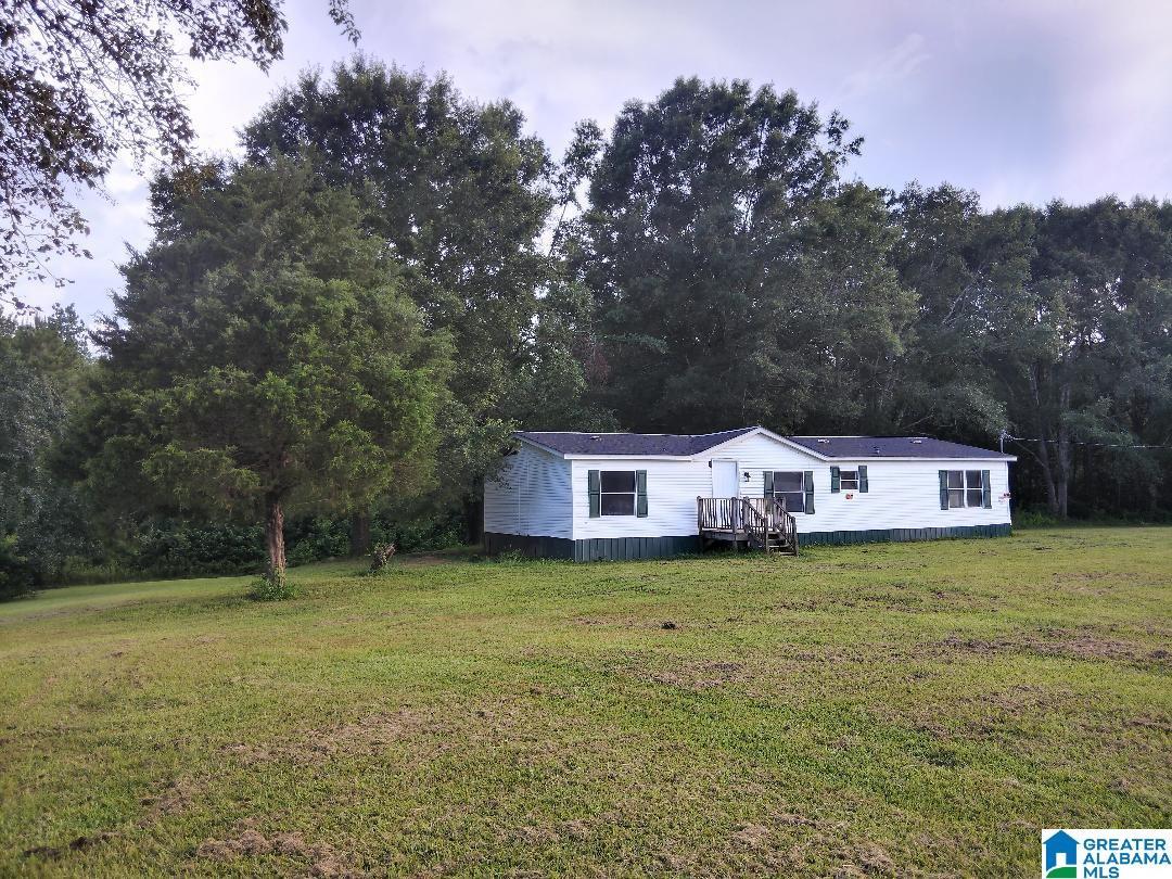 Image 1: Left side yard view