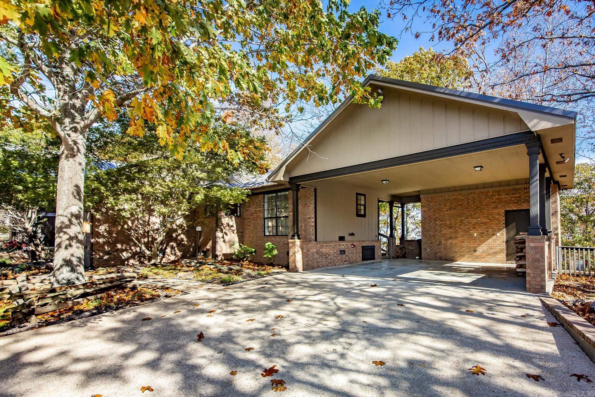 Image 1: Oversized carport including 2 storage closets