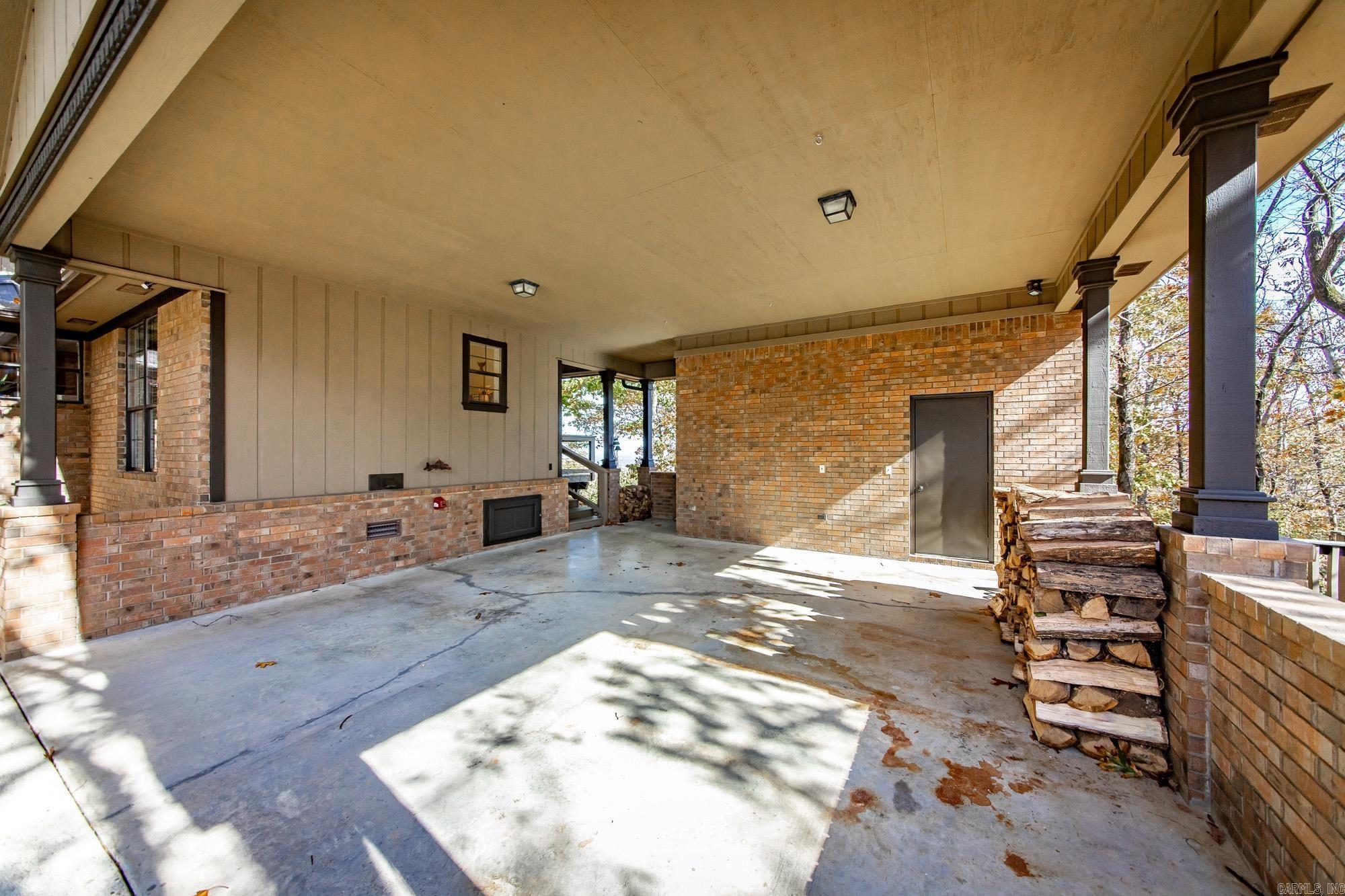 Image 3: Carport - Features a covered path to the back door
