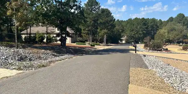 Image 2: Paved rd to property, Sloped