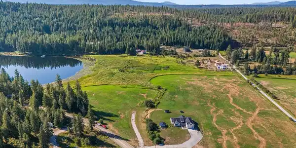 Image 2: 03-Aerial front of home
