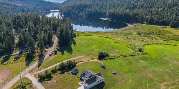 Image 3: 04-Aerial front of home