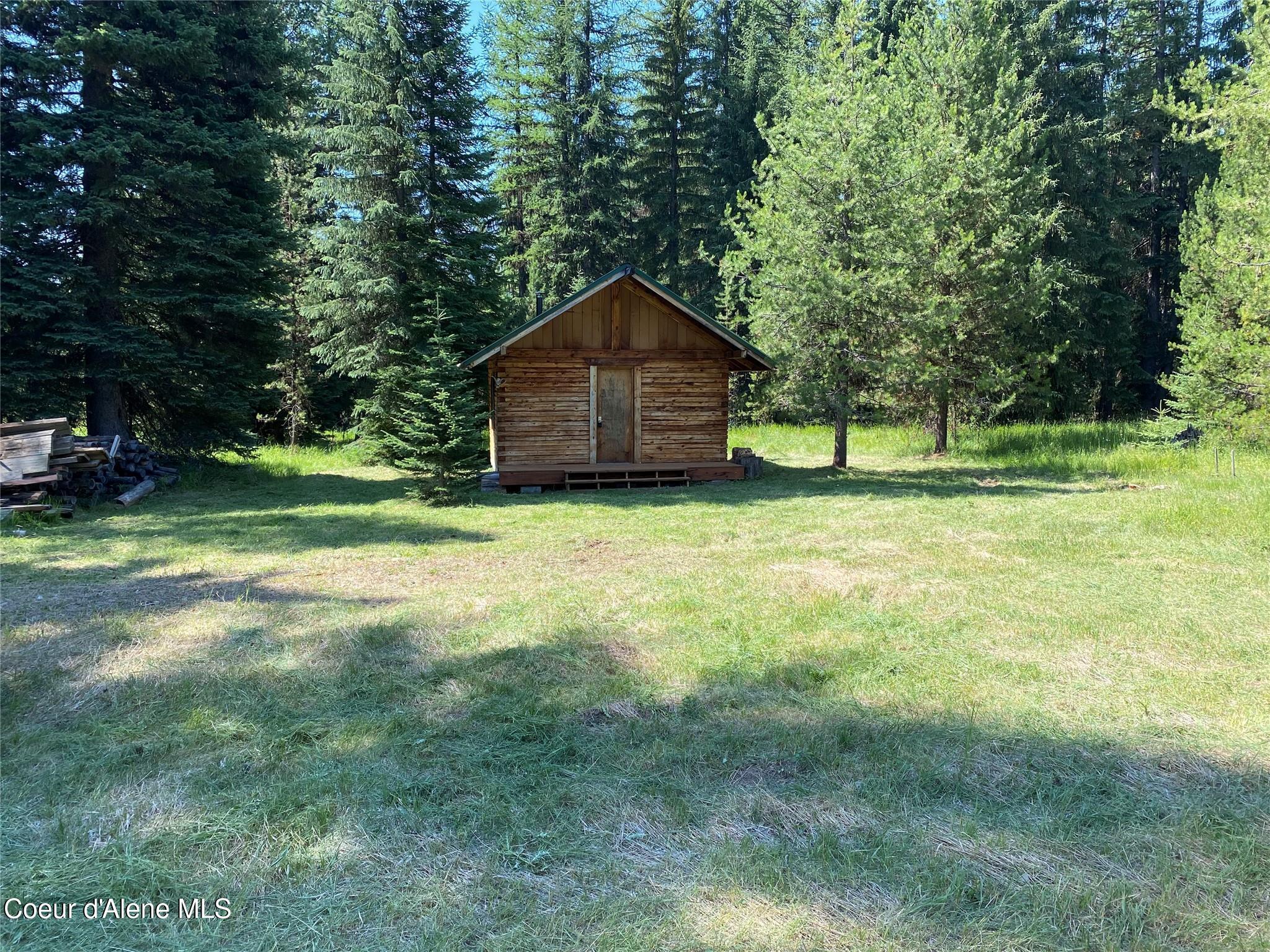 Image 2: Hunting Cabin with Stove
