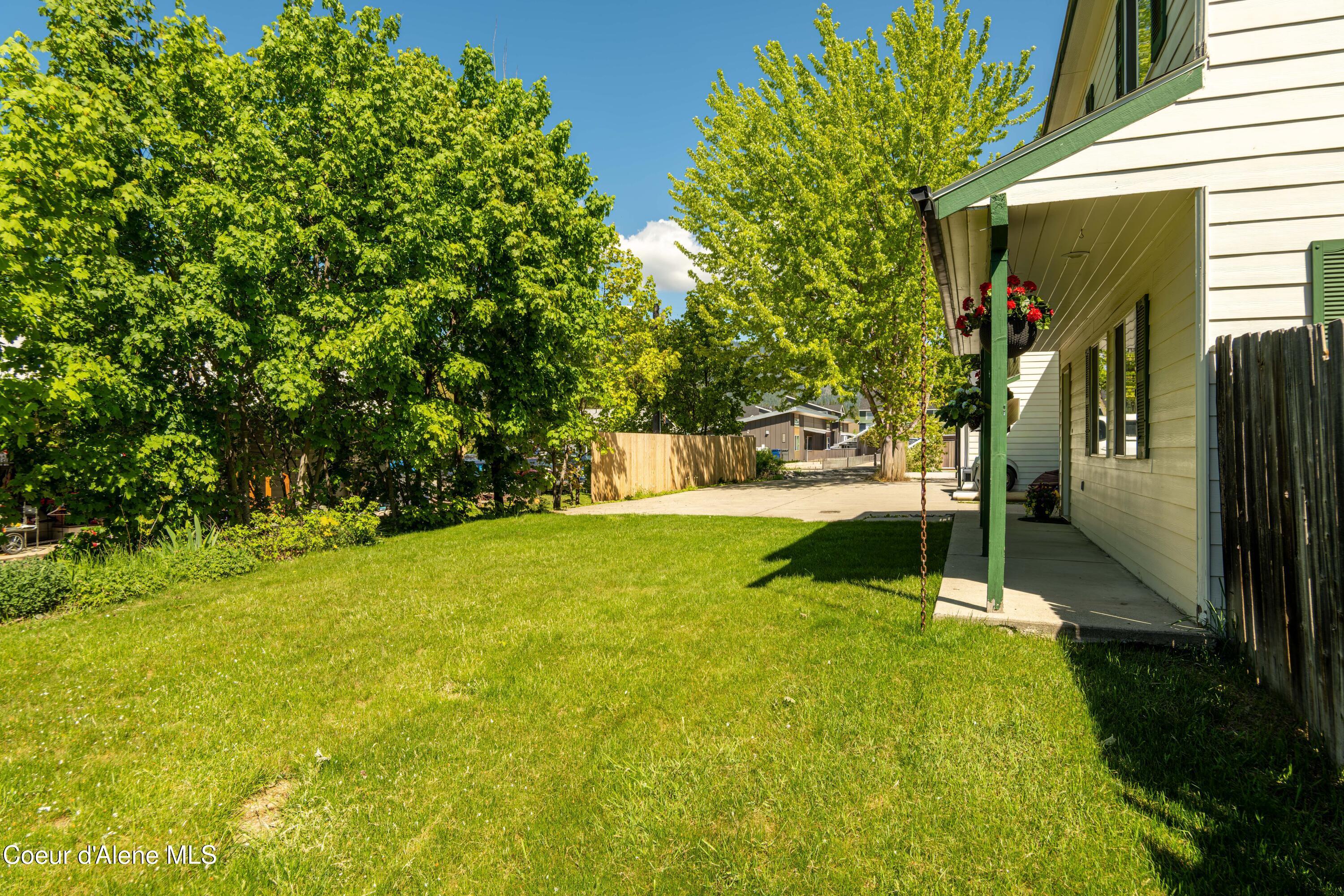 Image 4: Front yard-Covered Porch X