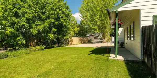 Image 4: Front yard-Covered Porch X