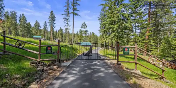 Image 3: Asphalt Drive & Gated Entry