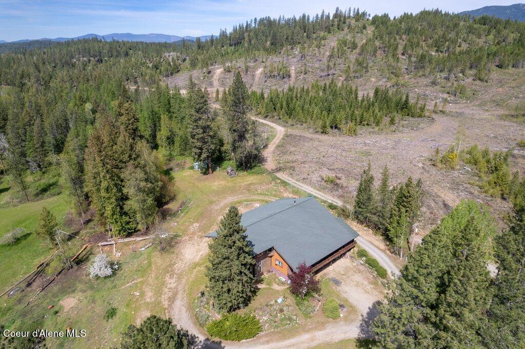 Image 3: Over head house
