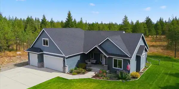 Image 2: 06-Aerial Front of Home