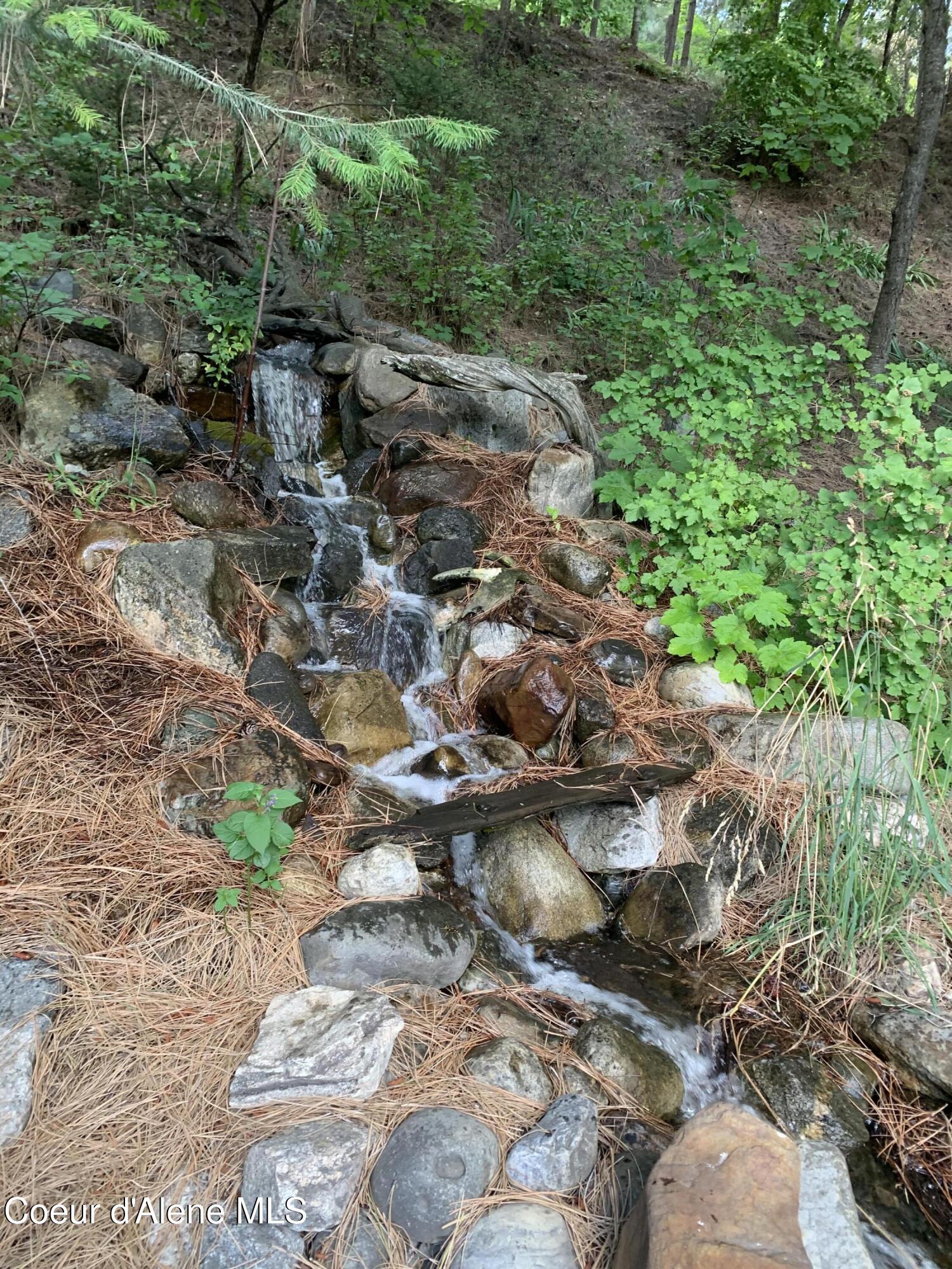 Image 3: Waterfall into pond