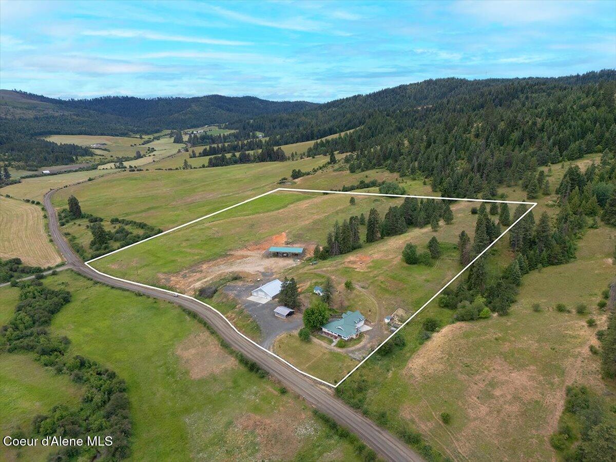 Image 1: Aerial front of home