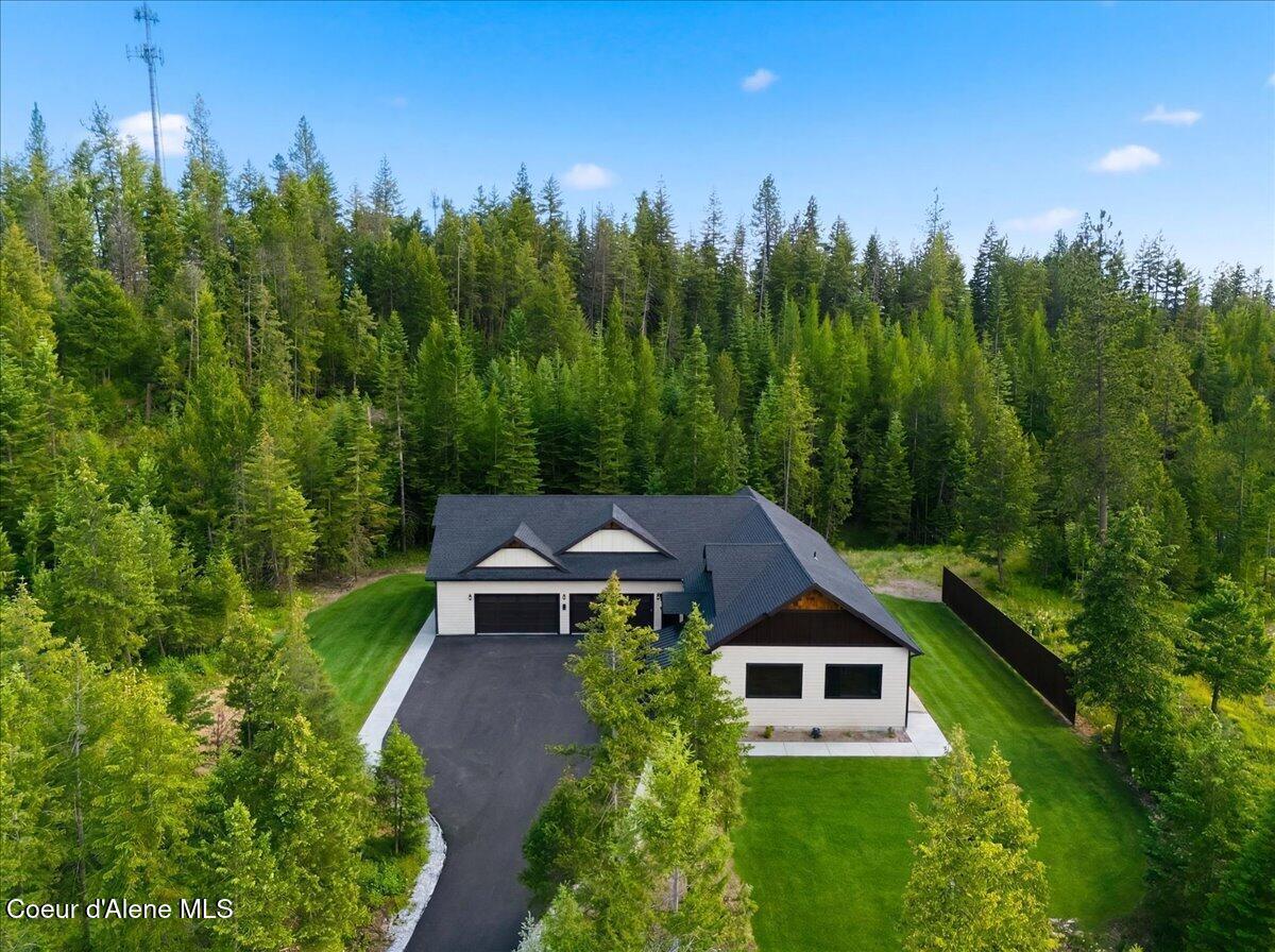 Image 1: Aerial Front of Home