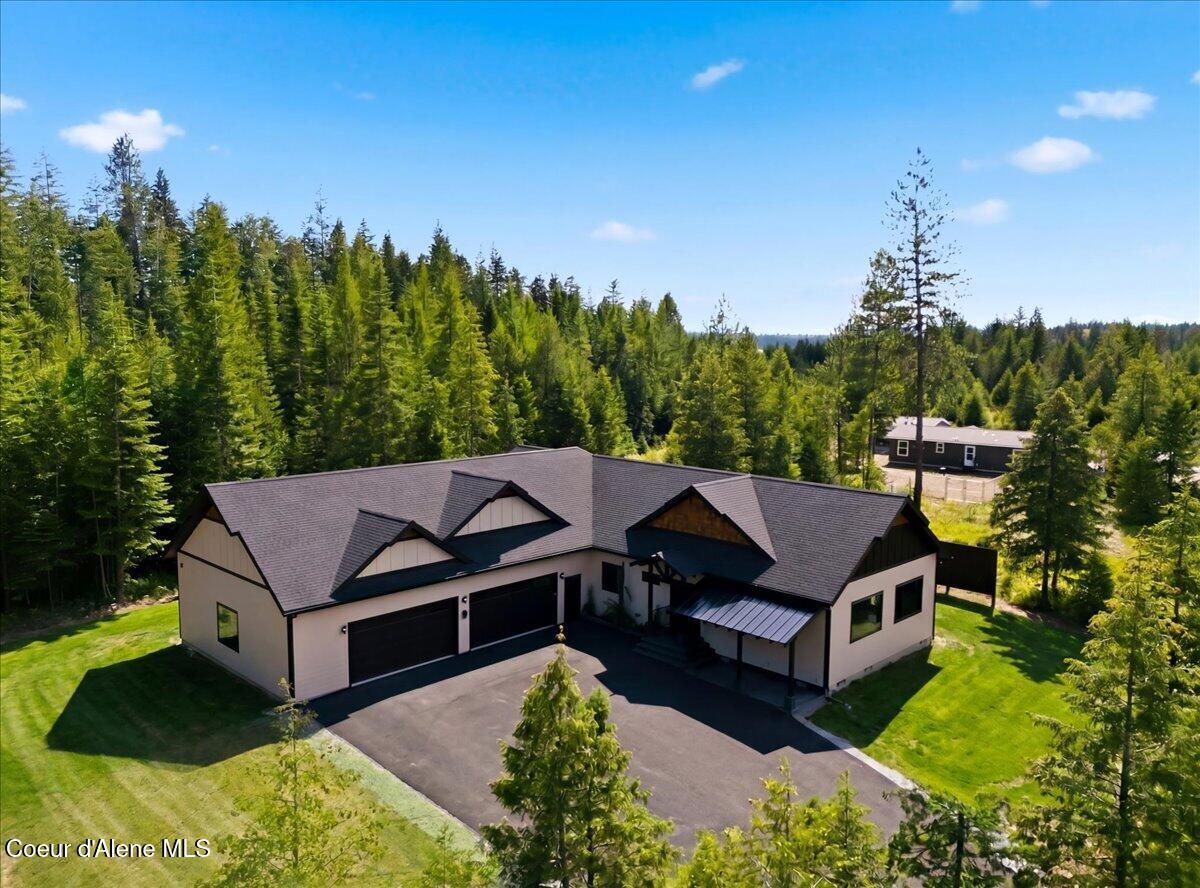 Image 4: Aerial Front of Home