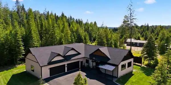 Image 4: Aerial Front of Home
