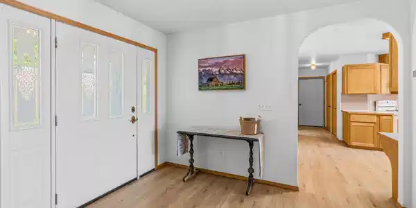 Image 4: Front door view into kitchen