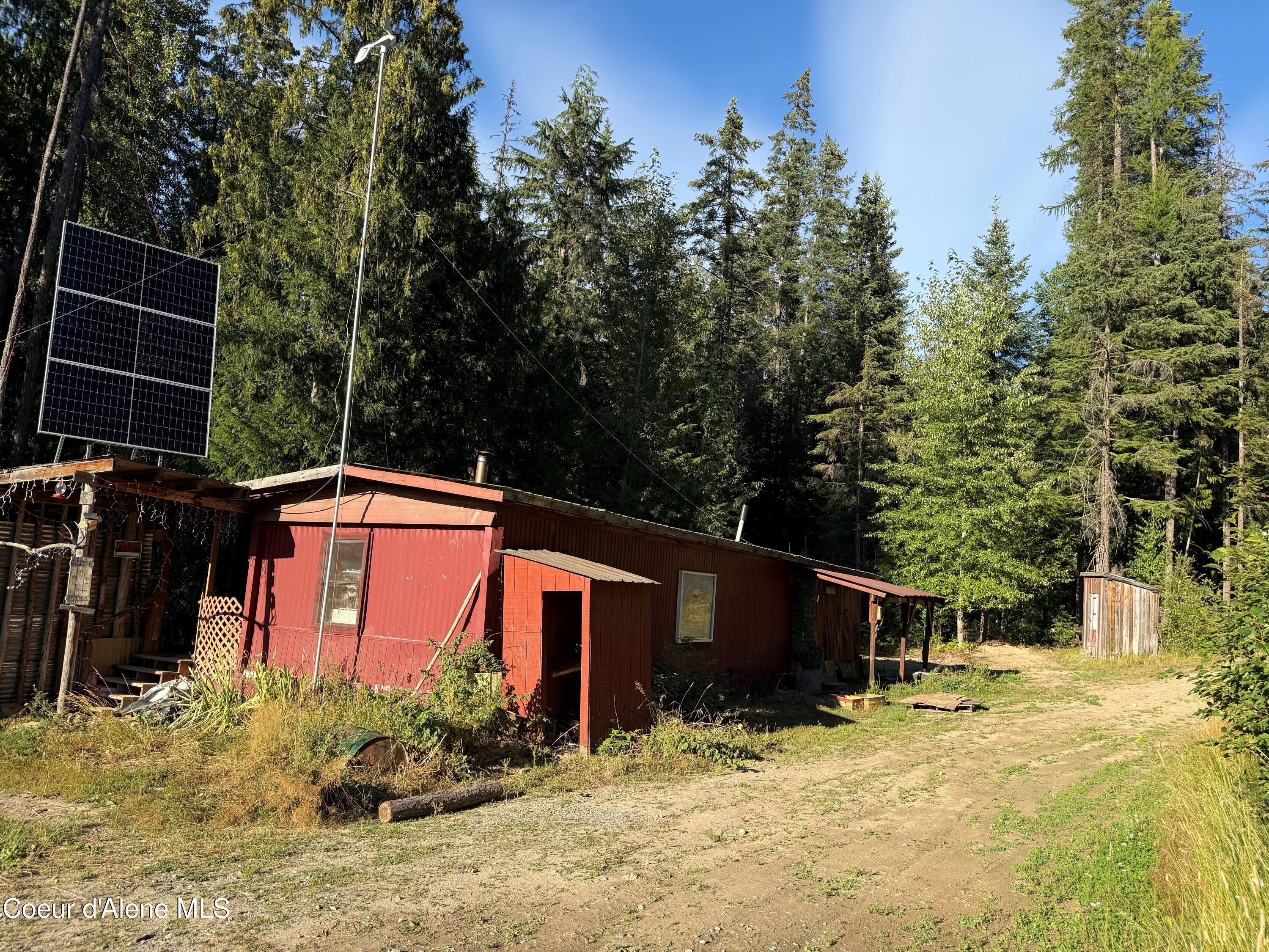 Image 1: Front/side of home