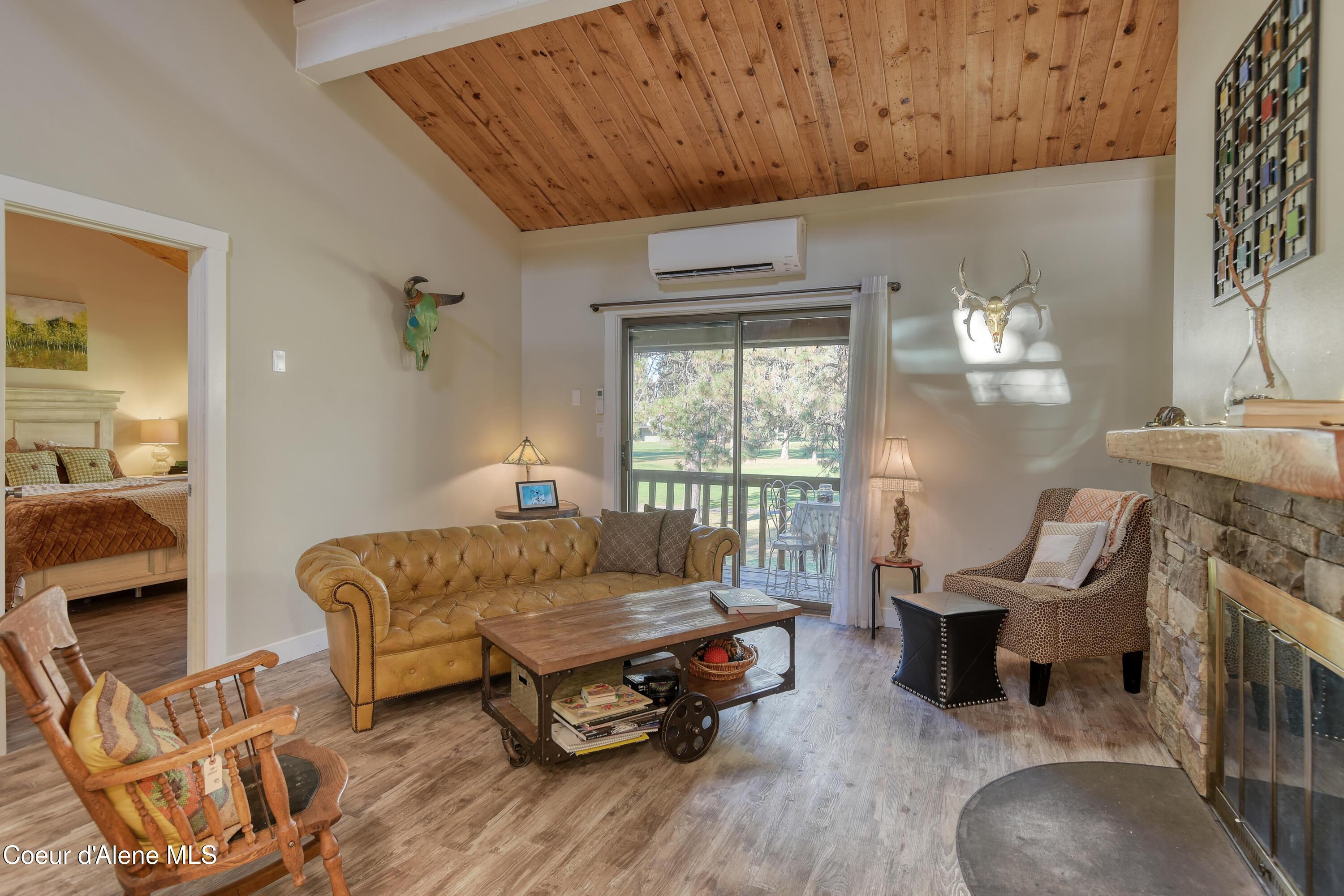 Image 3: Living Room with Covered Balcony