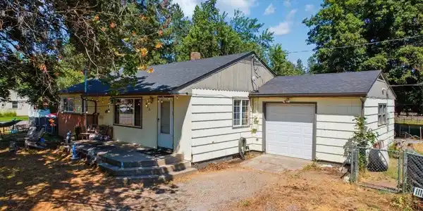 Image 2: Front with garage