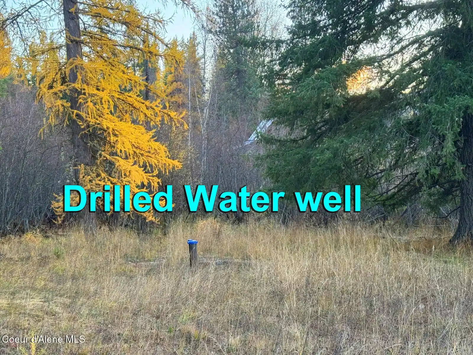 Image 1: Drilled well
