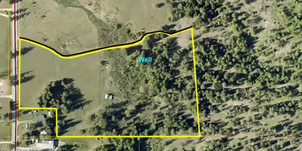 Image 4: Close up aerial and showing the well