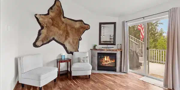 Image 3: Cozy Fireplace with Deck Access