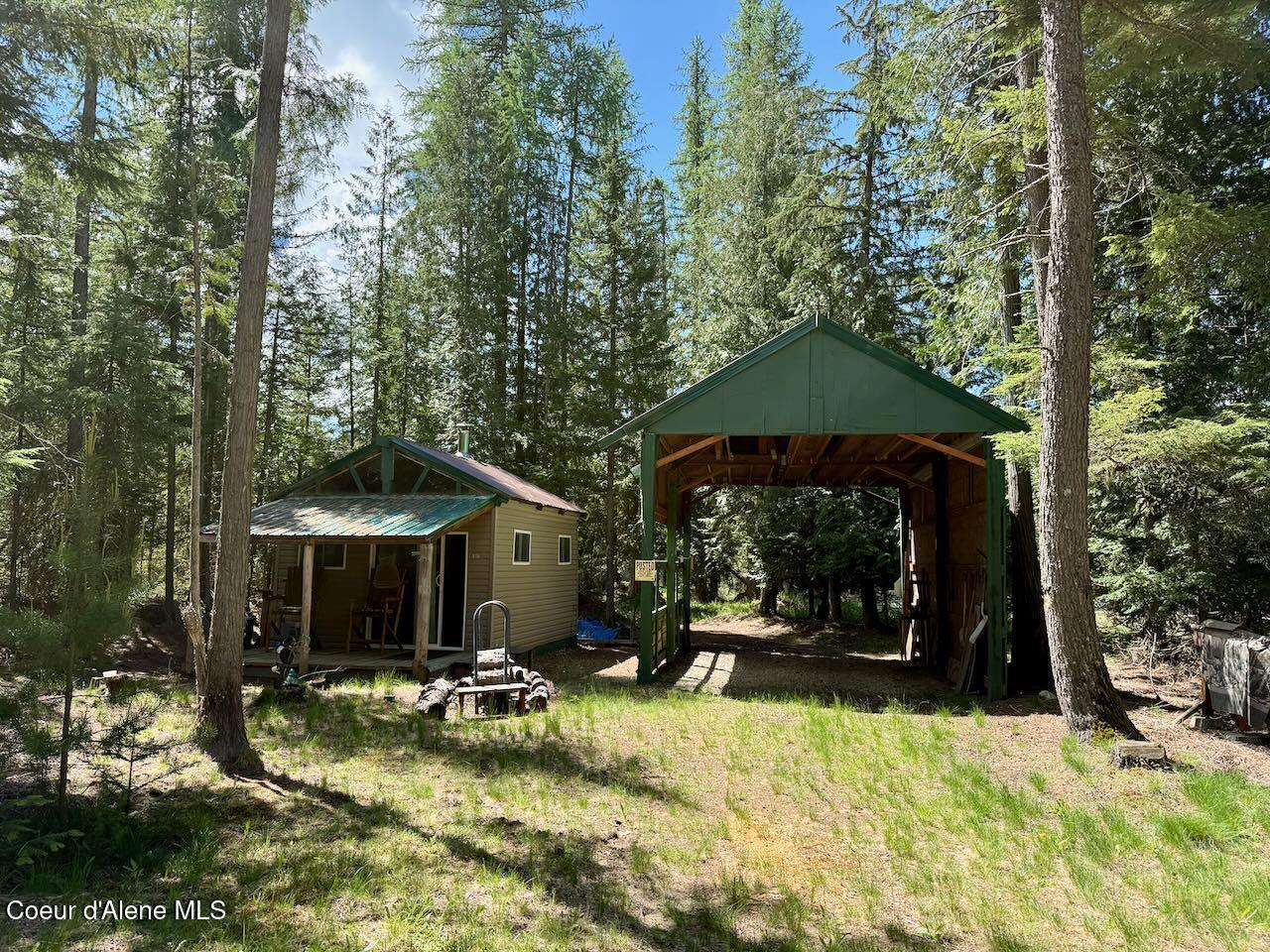 Image 1: Cabin & Covered RV