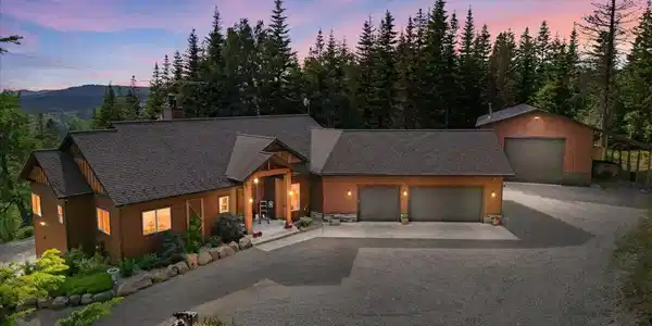 Image 2: 02-Aerial Twilight Front of Home_Waterma