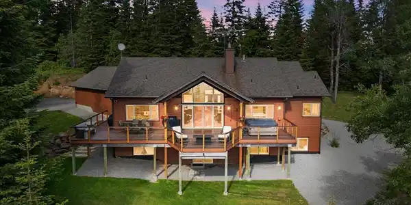 Image 4: 04-Aerial Twilight Back of Home_Watermar
