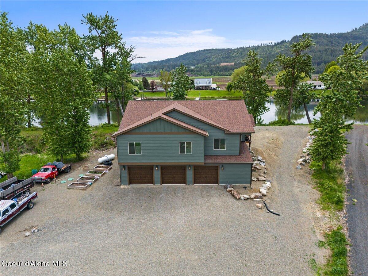 Image 4: 03-Aerial front of home