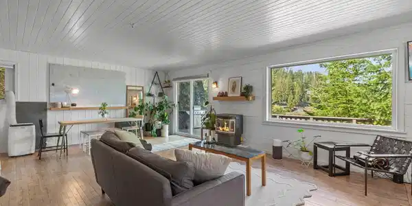 Image 3: Bright Living Room Lake Views