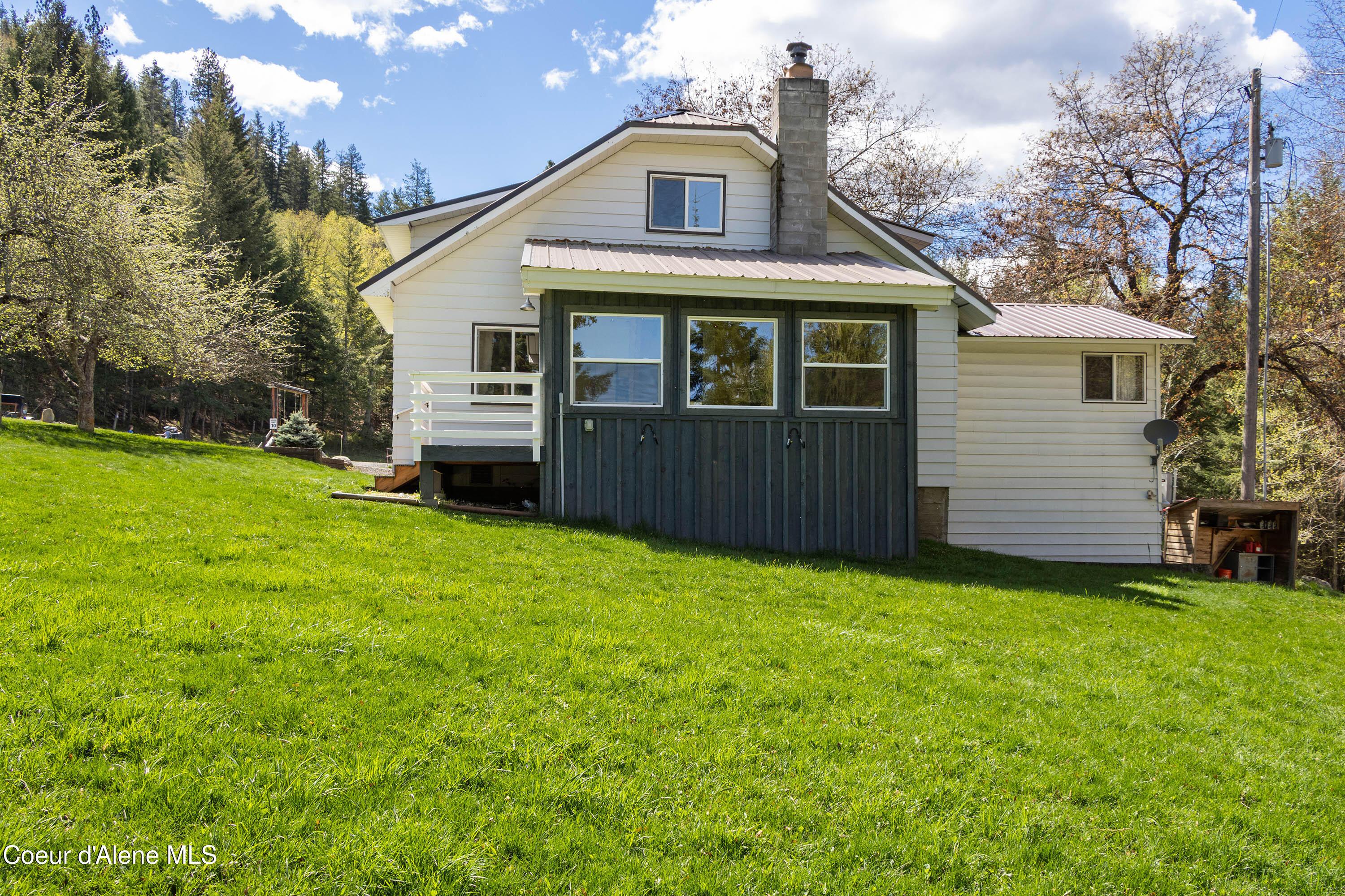 Image 2: N side; enclosed porch