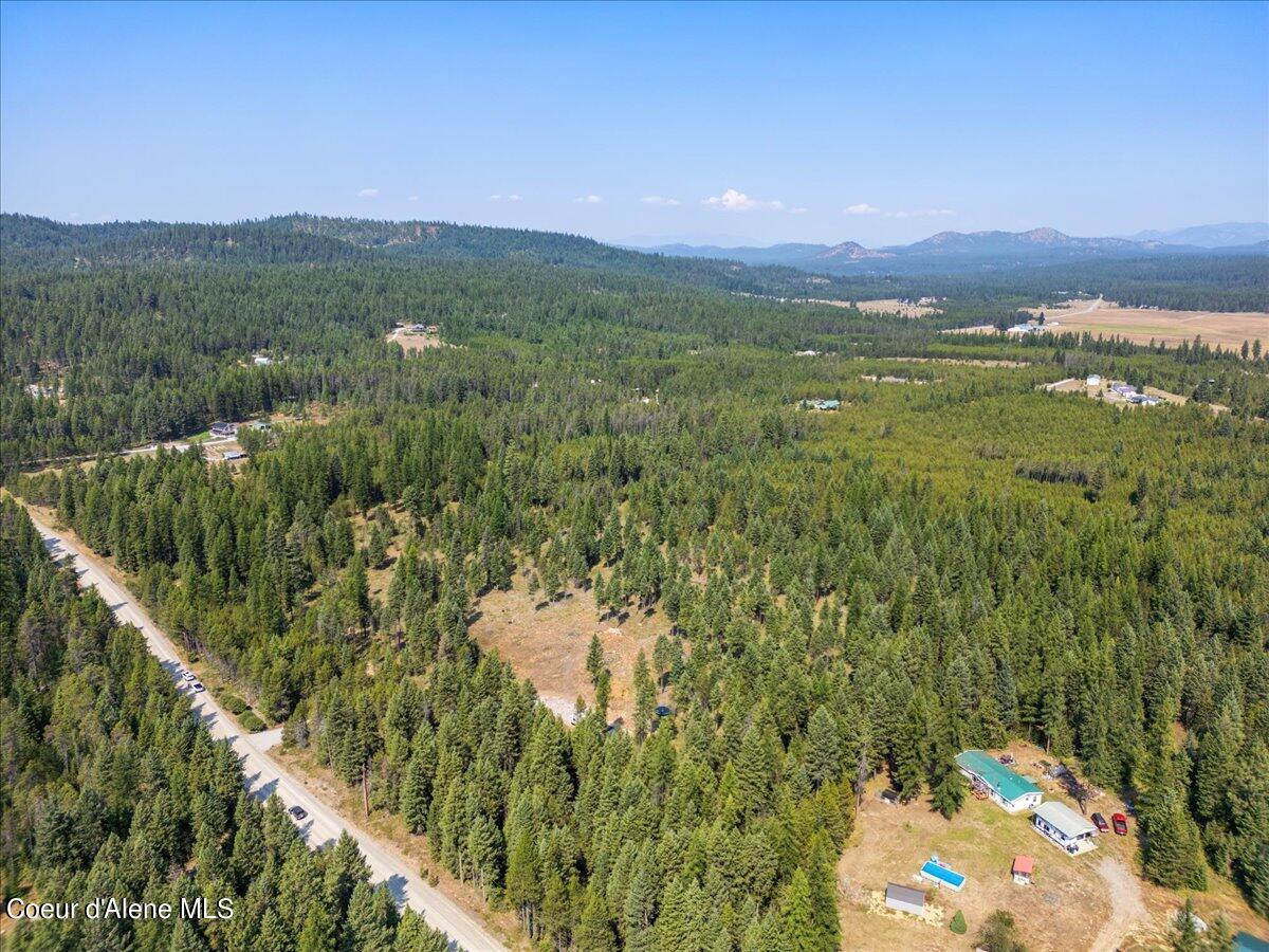 Image 3: 03-Aerial front of property