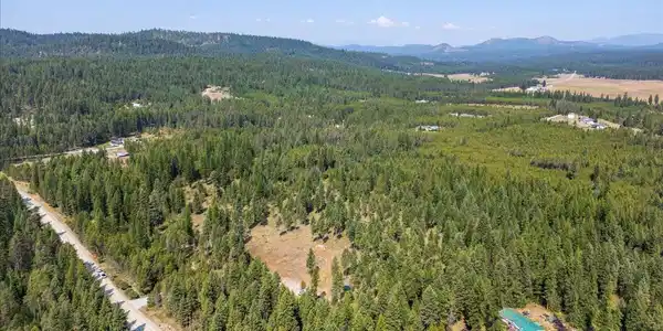 Image 3: 03-Aerial front of property
