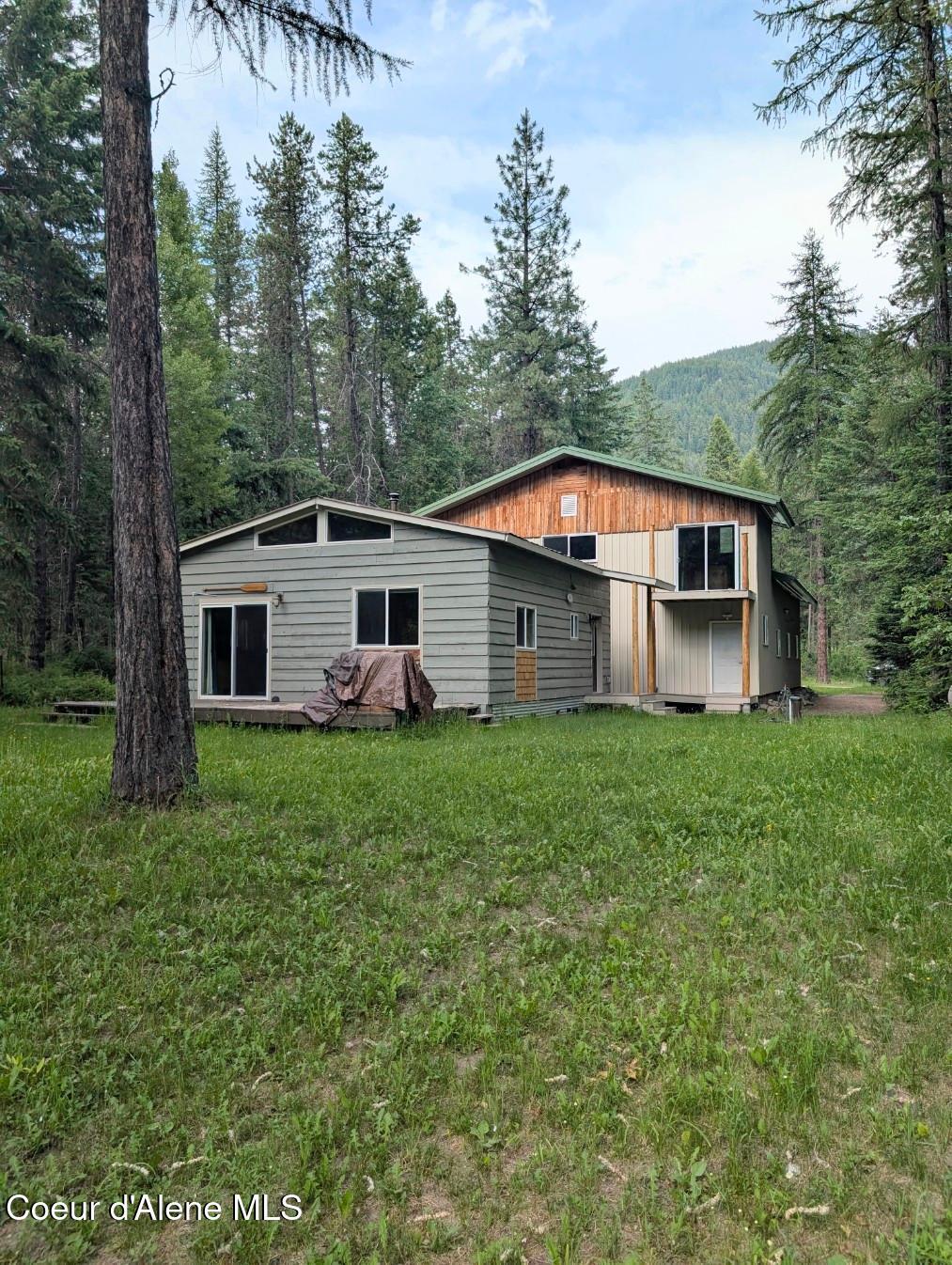 Image 1: From the river looking at the house